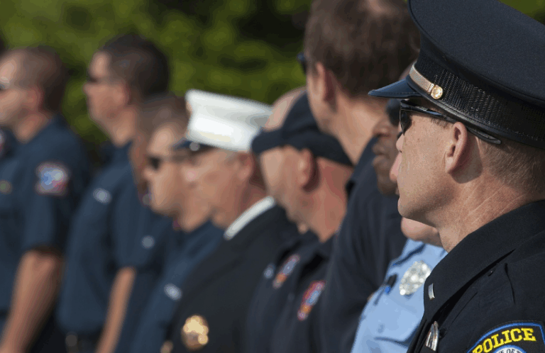 Photo of police officers standing in uniform